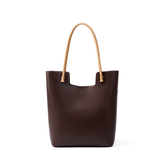 Genuine leather vertical shoulder bag with pockets