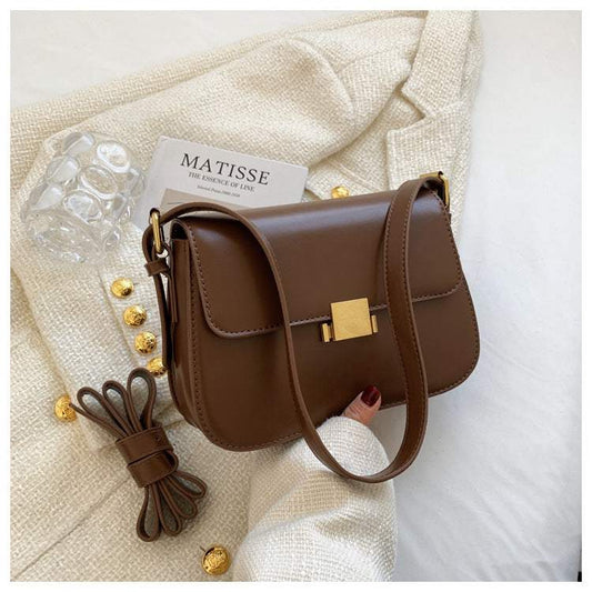 Compact PU bag Ravenna with lock-style opening and single strap in multiple colors
